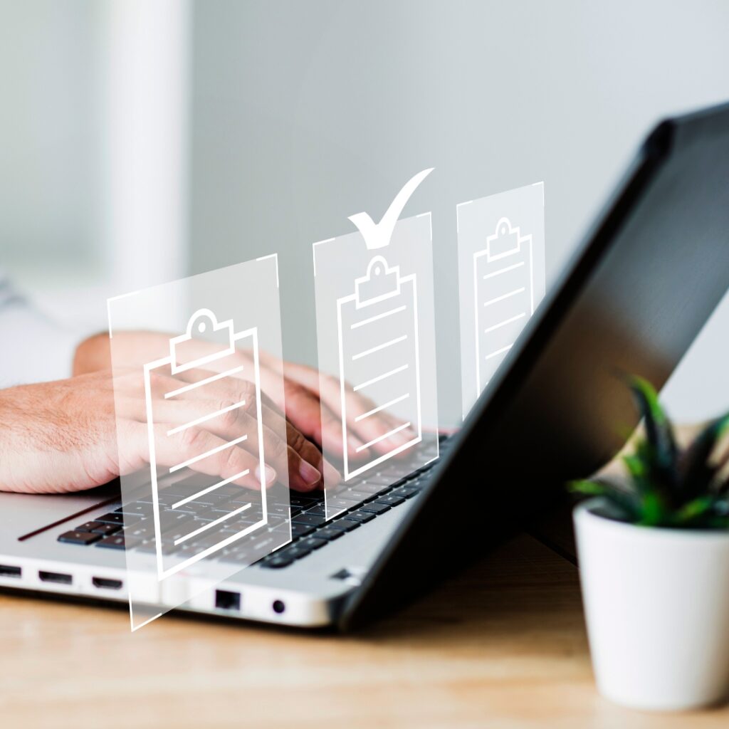 a person typing on a laptop